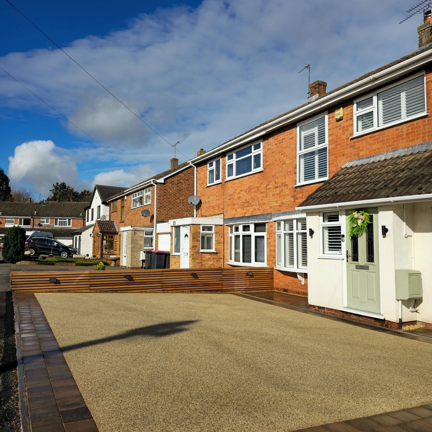 Wider street view of the completed resin driveway